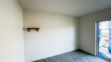 韮崎市に建つ、家族との空間が広がるウッドデッキのあるお家